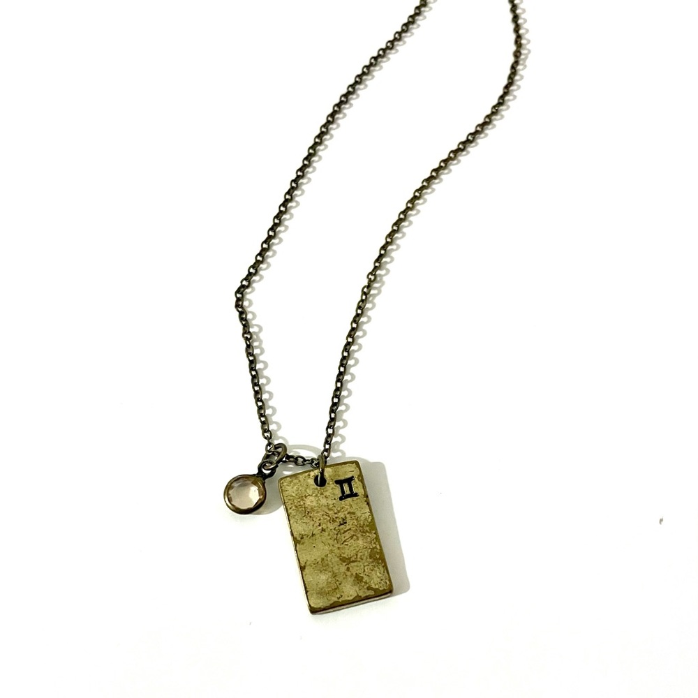 Long Gemini pendant necklace from Urban Outfitters